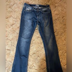 Bootcut jeans with detailed stitching on pockets size 7